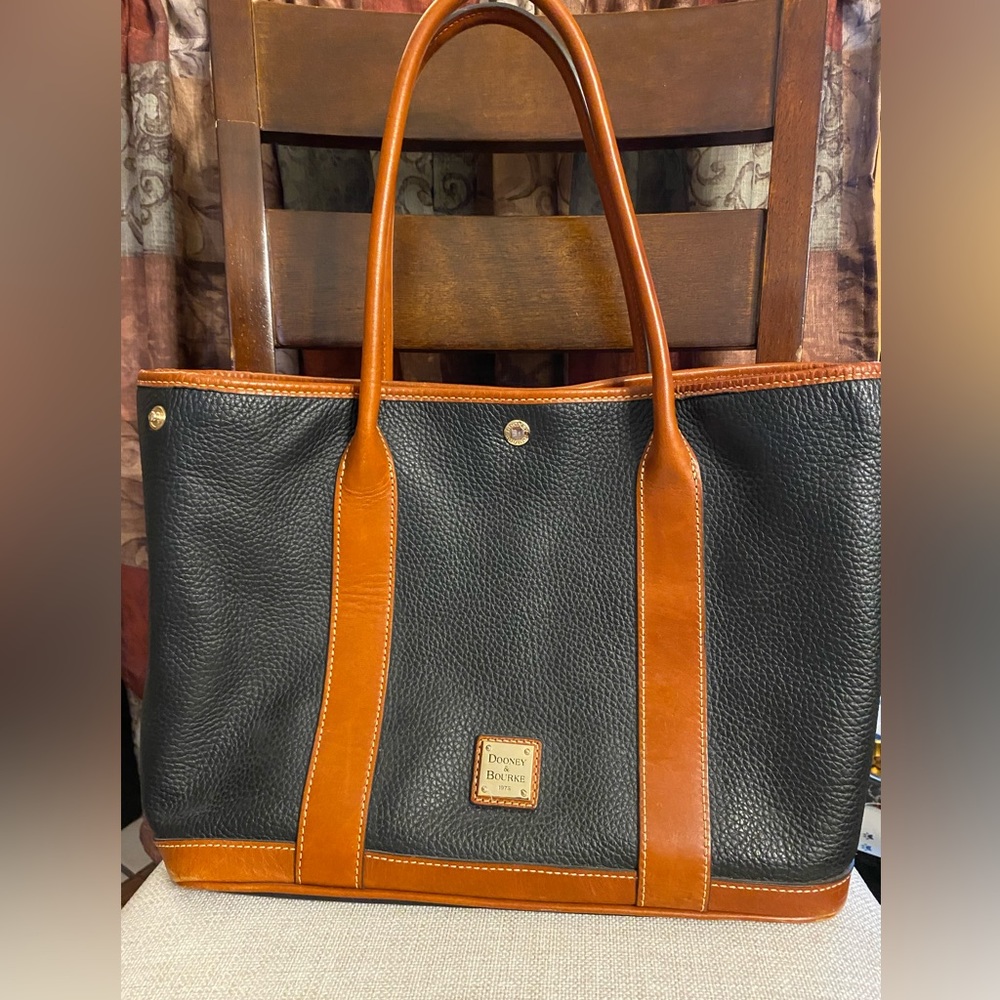 Dooney and Bourke large pebble leather purse.